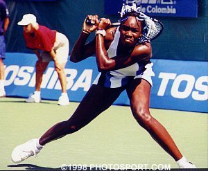 Venus Williams swats a return. Please wait for image to load.